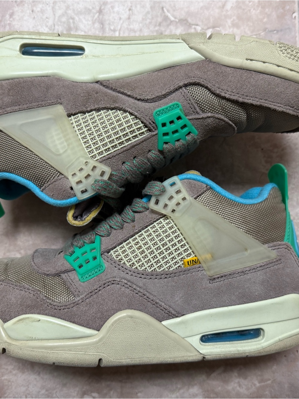 Jordan 4 union Sneakers in Taupe with Teal and Blue Accents